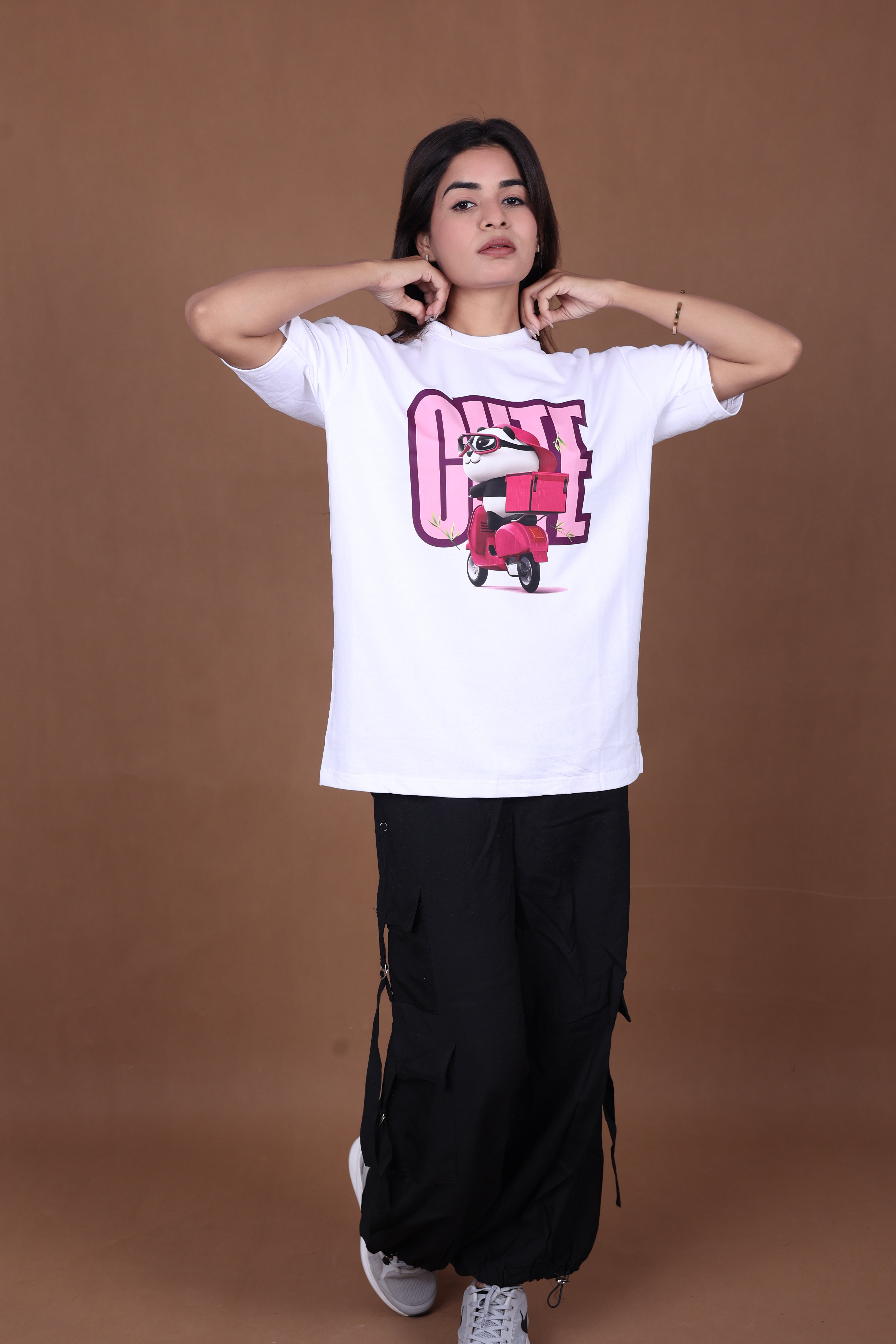 Printed Oversized T-shirt | Cute Panda Scooter Graphic | White T-Shirt